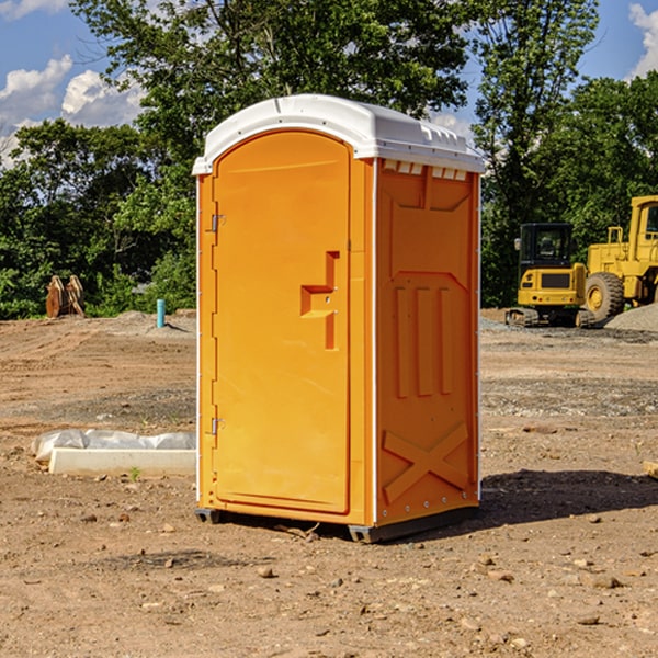 what is the cost difference between standard and deluxe portable restroom rentals in Dola OH